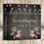 Rustic Barn Wood Wedding Scrapbook Album 3 Ring Binder<br><div class="desc">Cherish your wedding photos in this scrapbook album with old, dark barn wood background with hanging string lights above and burgundy blush floral bouquet corners at bottom left and right on front and back. To Customize anything, use the personalize button, and if you wish to click the Customize further link....</div>