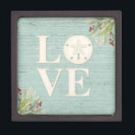 Rustic Beach Love Keepsake Gift Box<br><div class="desc">A beautiful keepsake box with a beach theme. Decorated with the word "Love" ,  beach grasses and a rustic blue wood background. Perfect for all of you special jewelry or trinkets. Designed for you by Blackberry Boulevard.</div>