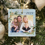 Rustic Beach Wood Starfish Family Photo Christmas Ceramic Ornament<br><div class="desc">This beach inspired Christmas ornament with a rustic wood background makes a great annual holiday keepsake, easily customized for a unique gift with the photo and text templates. Holiday watercolor sprigs of holly, pine, and starfish in two corners frame the photos on both sides. Please contact me through Zazzle Chat...</div>