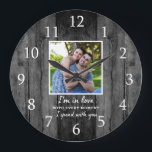 Rustic Black Wood Wedding Anniversary Love Photo Large Clock<br><div class="desc">Wedding anniversary clock with  a romantic quote 'I'm in love with every moment I spent with you' to express your love.Personalize with your favorite couple photo.</div>