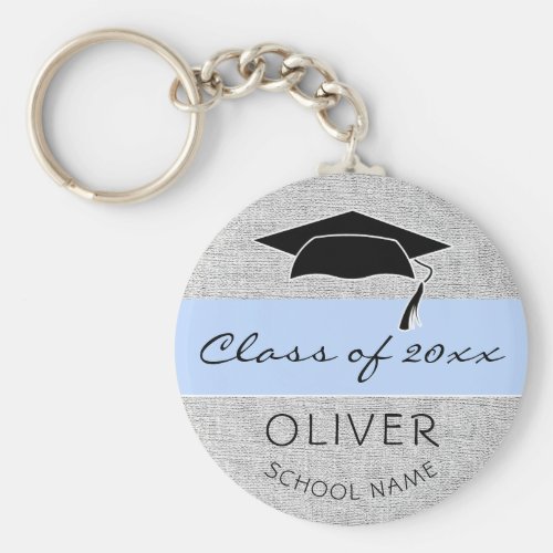 Rustic Blue Class of and Graduate Name Graduation Keychain - Modern Rustic Blue Class of Graduation Keychain with a graduate name, school name, class year and black graduation cap. Blue stripe on grey rustic background. Personalize the keychain and make a great personalized gift and keepsake for a graduate.