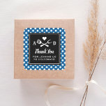 Rustic Blue Gingham BBQ Wedding Thank You Square Sticker<br><div class="desc">Wedding thank you favor stickers feature a black and white barbecue themed design with a BBQ fork and spatula grilling utensils and a heart accent. Personalize the custom monogram initials and "Thank you for joining us to celebrate!" message. Includes a navy, blue and white gingham tablecloth patterned background. Perfect for...</div>