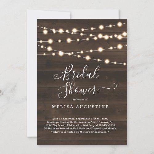 Rustic Bridal Shower Invitation - String lights on a rustic wood background complemented by beautiful calligraphy.