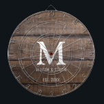Rustic Brown Wood Farmhouse Family Monogram Dart Board<br><div class="desc">Rustic Brown Barn Wood Farmhouse Family Monogram Dart Board is designed with horizontal dark faux barn wood planks. It is monogrammed with large white initial on the center followed by couple's names and established year. Makes a great game for friends and family at a house party, wedding or family reunion....</div>