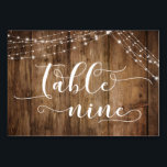 Rustic Brown Wood & Light Strings Table Nine Card<br><div class="desc">This rustic, elegant wedding and event invitation suite of designs presents some popular wedding design trends combined in a fresh way. With a rich brown wood background and dual strings of twinkling light accents, I've combined a beautiful modern script font to render graphics depicting key words and phrases in the...</div>