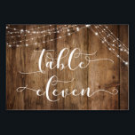 Rustic Brown Wood & Lights Table Eleven Card<br><div class="desc">This rustic, elegant wedding and event invitation suite of designs presents some popular wedding design trends combined in a fresh way. With a rich brown wood background and dual strings of twinkling light accents, I've combined a beautiful modern script font to render graphics depicting key words and phrases in the...</div>