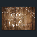 Rustic Brown Wood & Lights Table Twelve Card<br><div class="desc">This rustic, elegant wedding and event invitation suite of designs presents some popular wedding design trends combined in a fresh way. With a rich brown wood background and dual strings of twinkling light accents, I've combined a beautiful modern script font to render graphics depicting key words and phrases in the...</div>