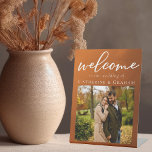 Rustic Burnt Orange Photo Autumn Wedding Welcome Pedestal Sign<br><div class="desc">Follow the autumn trend of earthy tones with our burnt orange to brown gradient fall wedding welcome pedestal sign. Simple white typography on a rustic poster with your couple engagement photo for a minimalist look. Bohemian hues reminiscent of terracotta clay highlight your elegant calligraphy on this trendy color fade textured...</div>