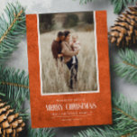 Rustic Burnt Orange Winter Christmas Single Photo Holiday Card<br><div class="desc">This simple and rustic holiday design features your best portrait photo over a rustic paper texture in Burnt Orange color and the word "Merry Christmas" in vintage script text . Perfect for farmhouse style greeting cards. Easily add your best photo, your family names and year using the template. Add a...</div>