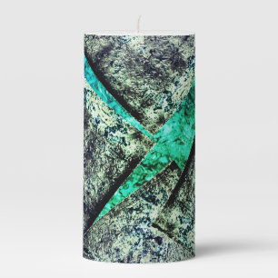 Rustic carbon-dirty disorganized layer on aquarine pillar candle