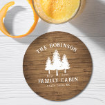 Rustic Country Family Cabin Trees Wood Plank Print Round Paper Coaster<br><div class="desc">Personalize your country home with beautiful rustic themed round paper coasters (several shapes to choose from), featuring your name and "Family Cabin", Ranch, Cottage or other text along with its established date and location if desired. This custom, unique design features rustic country style text with a white silhouette of pine...</div>