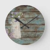 https://rlv.zcache.com/rustic_country_lavender_whitewash_blue_barn_wood_round_clock-r723bf0e126fb442bb8728e7cd82b5fee_s0ys6_8byvr_166.jpg