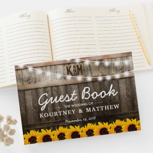 Rustic Country Wedding | Sunflower String Lights Guest Book - SUNFLOWER VINEYARD WEDDING GUESTBOOK | Country barn dark oak barrel background, twinkle string lights, golden yellow sunflowers, your monogram and modern wedding wording. Find other wood wedding invitations at http://www.zazzle.com/special_stationery