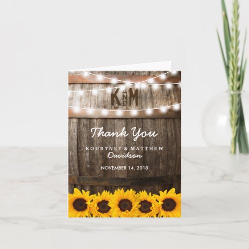 Rustic Country Wedding | Sunflower Thank You - SUNFLOWER VINEYARD WEDDING THANK YOU NOTE | Country barn dark oak barrel background, twinkle string lights, golden yellow sunflowers, your monogram and a modern thank you template. Find other wood thank you cards at http://www.zazzle.com/special_stationery