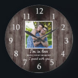Rustic Dark Wood Wedding Anniversary Love Photo   Large Clock<br><div class="desc">Wedding anniversary clock with  a romantic quote 'I'm in love with every moment I spent with you' to express your love.Personalize with your favorite couple photo.</div>