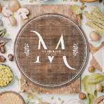Rustic & Elegant Monogram Faux Wood Round Cutting Board<br><div class="desc">This rustic design features an elegant monogram accented with vines on each side, on a faux wood background. This is great for a Christmas gift for newlyweds, a wedding gift or a housewarming gift. Click the customize button for more flexibility in adjusting the text! Variations of this design as well...</div>