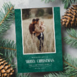 Rustic Emerald Green Winter Christmas Single Photo Holiday Card<br><div class="desc">This simple and rustic holiday design features your best portrait photo over a rustic paper texture in emerald green color and the word "Merry Christmas" in vintage script text . Perfect for farmhouse style greeting cards. Easily add your best photo, your family names and year using the template. Add a...</div>