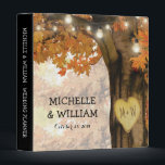 Rustic Fall Autumn Tree Twinkle Lights Wedding 3 Ring Binder<br><div class="desc">Autumn woodland wedding planner album featuring a rustic fall tree covered in red, orange and yellow leaves, a carved heart with your initials, string twinkle lights and a modern text template. For further customization, please click the "Personalize it" button to modify this template. All text style, colors, and sizes can...</div>