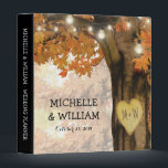 Rustic Fall Autumn Tree Twinkle Lights Wedding 3 Ring Binder<br><div class="desc">Autumn woodland wedding planner album featuring a rustic fall tree covered in red, orange and yellow leaves, a carved heart with your initials, string twinkle lights and a modern text template. For further customization, please click the "Personalize it" button to modify this template. All text style, colors, and sizes can...</div>