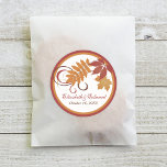 Rustic Falling Leaves Rust Red Wedding Monogram Classic Round Sticker<br><div class="desc">Rustic and elegant round fall themed wedding monogram favor stickers. Our "Falling Leaves" wedding stationery features saturated fall foliage and scrolling swirls. Colors include orange, copper, brown, red and gold. Response Card - Style 1: Response Card - Style 2 (includes entrée options): com com Response Postcard (address on reverse side):...</div>