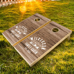 Rustic Family Cabin Retro Vintage Name Wood Cornhole Set<br><div class="desc">Rustic custom modern family cabin cornhole set with a trendy forest mountain range design with pine trees,  woods,  and birds surrounded by your custom family name,  a personalizable name of your cottage,  lake or beach house,  as well as the year established.</div>