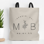 Rustic Floral Stem Wedding Monogram | Light Beige Tote Bag<br><div class="desc">Custom printed tote bags make a fun and functional wedding favor your guests will love! Personalize the template with the bride and groom's names or monogram initials. Add your wedding date, the city, state or venue name or any other custom text. This modern rustic logo-style design has a simple floral...</div>