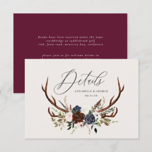 Rustic foliage, floral and stag wedding details save the date