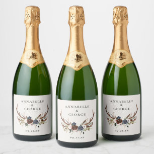 Rustic foliage, floral and stag wedding details sparkling wine label