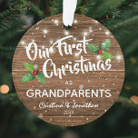 Rustic Grandparents First Christmas Photo Ornament<br><div class="desc">Surprise your parents with this sentimental our first christmas as grandparents tree ornament featuring a rustic wooden background,  holly,  snowflakes,  string lights,  their names,  and the year. On the reverse is a precious photo of your grandchild.</div>