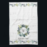 Rustic Greenery Watercolor Laurel Wreath Monogram Kitchen Towel<br><div class="desc">This personalized rustic themed kitchen towel features a hand painted watercolor greenery laurel wreath with a monogram initial in the middle on a background of white and gray weathered wood. Below is your family name and border of botanical leaves. From our hearts to yours,  enjoy!</div>