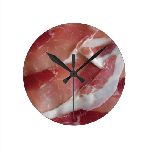 Rustic ham prosciutto as background round clock