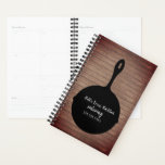 Rustic Iron Skillet Catering Restaurant Business Planner<br><div class="desc">Illustration of iron skillet with custom white text.  Background is rustic wood plank.</div>