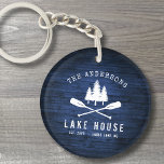 Rustic Lake House Boat Oars Trees Blue Wood Print Keychain<br><div class="desc">A beautiful, rustic themed 2 sided acrylic keychain, featuring your family name and "Lake House" or other desired text along with its established date and location. This custom, unique design features a white silhouette of crossed boat oars and pine trees on a print of wood planks in rich blue colors....</div>