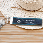 Rustic Lake House Boat Oars Trees Blue Wood Print Wrist Keychain<br><div class="desc">A beautiful, rustic themed wrist keychain - keyring, featuring your family name and "Lake House" or other desired text along with its established date and location. This custom, unique design features a white silhouette of crossed boat oars and pine trees on a wood style print in shades of deep blue...</div>