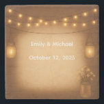 Rustic Mason Jar & String Lights wedding  Stone Coaster<br><div class="desc">Add rustic charm to your wedding tables with these personalized coasters featuring glowing mason jar string lights on a wood-style background. Customize with your names and wedding date for a cozy,  farmhouse-inspired touch. Perfect for barn weddings,  bridal showers,  or as thoughtful wedding favors guests can take home.</div>