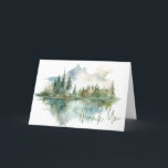 Rustic Mountain Lake Scene Watercolor Folded Thank You Card<br><div class="desc">Escape to a serene mountain retreat with your folded wedding thank you card. This exquisite design showcases a breathtaking watercolor painting of a majestic mountain, its slopes draped in lush pine trees, mirroring their beauty in the crystal-clear waters below. The muted natural tones of tan, greens, teal blues, and grays...</div>