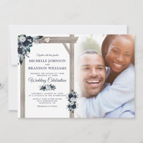Rustic Navy & Dusty Blue Floral Photo Wedding Invitation - Rustic blue wedding invitations featuring a trendy white background that can be changed to any color, a rustic wooden wedding arch, boho chic dusty blue & navy watercolor flowers, a carved heart with the couples initials, a photo of the bride & groom, and a modern wedding template.