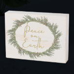 Rustic Peace on Earth Christmas Wreath Holiday Wooden Box Sign<br><div class="desc">Rustic Peace on Earth Christmas Wreath Holiday Wooden Box Sign featuring a woodsy,  yet elegant wreath and "Peace on Earth" in trendy gold foil style typography. Very modern and stylish,  yet rustic and homey! Designed by Zazzle Pro Designer BK Thompson exclusively for Cedar & String.</div>