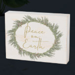 Rustic Peace on Earth Christmas Wreath Holiday Wooden Box Sign<br><div class="desc">Rustic Peace on Earth Christmas Wreath Holiday Wooden Box Sign featuring a woodsy,  yet elegant wreath and "Peace on Earth" in trendy gold foil style typography. Very modern and stylish,  yet rustic and homey! Designed by Zazzle Pro Designer BK Thompson exclusively for Cedar & String.</div>