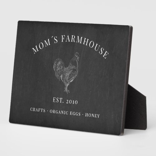 Rustic rooster sketch logo on chalkboard plaque