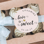 Rustic Script Pink Love is Sweet Wedding Favor Classic Round Sticker<br><div class="desc">Custom-designed wedding candy buffet favor stickers featuring gold glitter heart and "Love is Sweet" in elegant hand brushed script/calligraphy. Personalize this wedding favor sticker with bride and groom's names and wedding date for a touch of style to your wedding favors and gifts.</div>