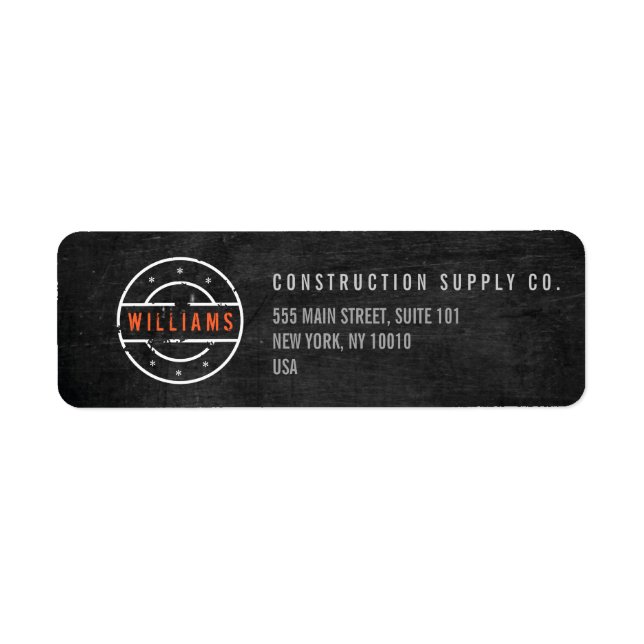 Rustic Stamped Logo on Black Wood Construction Label (Front)