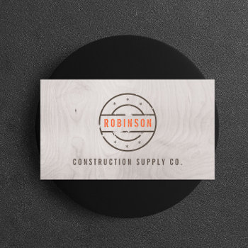 Rustic Stamped Logo On Gray Woodgrain Construction Business Card by 1201am at Zazzle