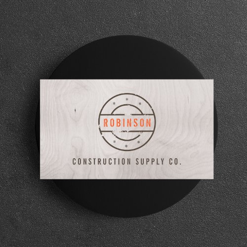 Rustic Stamped Logo on Gray Woodgrain Construction Business Card