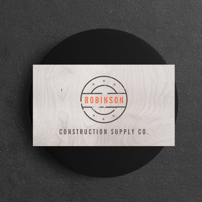 Rustic Stamped Logo on Gray Woodgrain Construction Business Card (Creator Uploaded)