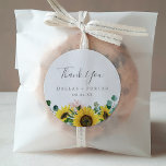 Rustic Sunflower Thank You Wedding Favor Sticker<br><div class="desc">These rustic sunflower thank you wedding favor stickers are perfect for a country wedding reception. The bohemian floral design features yellow sunflowers, blush pink flowers and hunter green eucalyptus greenery in watercolor with an elegant modern boho feel. Personalize the sticker labels with your names, the event (if applicable), and the...</div>