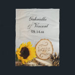 Rustic Sunflower Woodland Wedding Fleece Blanket<br><div class="desc">Customize the charming Rustic Sunflower Woodland Wedding Fleece Blanket with the names of the bride and groom and marriage ceremony date to create a cozy keepsake gift. This soft and snuggly nature themed nuptial blanket features a charming floral photograph of a yellow sunflower blossom, natural wood slice with the word...</div>