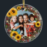 Rustic Sunflower Wreath Family Photo Christmas Ceramic Ornament<br><div class="desc">Create your own family photo Christmas ornaments using this easy to use ceramic ornament template. This unique and artistic watercolor design depicts a floral holiday wicker wreath decorated with cheerful sunflowers and burgundy red holly berries. The twisted wooden branches are accented with gold, luminous string lights and a tartan plaid...</div>