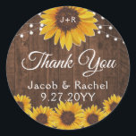 Rustic Sunflowers String Lights Wood Wedding Classic Round Sticker<br><div class="desc">This wedding design features pretty painted, watercolor sunflowers on a rustic wood background accented with string lights. Click the customize button for more flexibility in modifying the text or moving the graphics! Variations of this design as well as coordinating products are available in our shop, zazzle.com/store/doodlelulu. Contact us if you...</div>