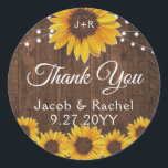 Rustic Sunflowers String Lights Wood Wedding Classic Round Sticker<br><div class="desc">This wedding design features pretty painted, watercolor sunflowers on a rustic wood background accented with string lights. Click the customize button for more flexibility in modifying the text or moving the graphics! Variations of this design as well as coordinating products are available in our shop, zazzle.com/store/doodlelulu. Contact us if you...</div>
